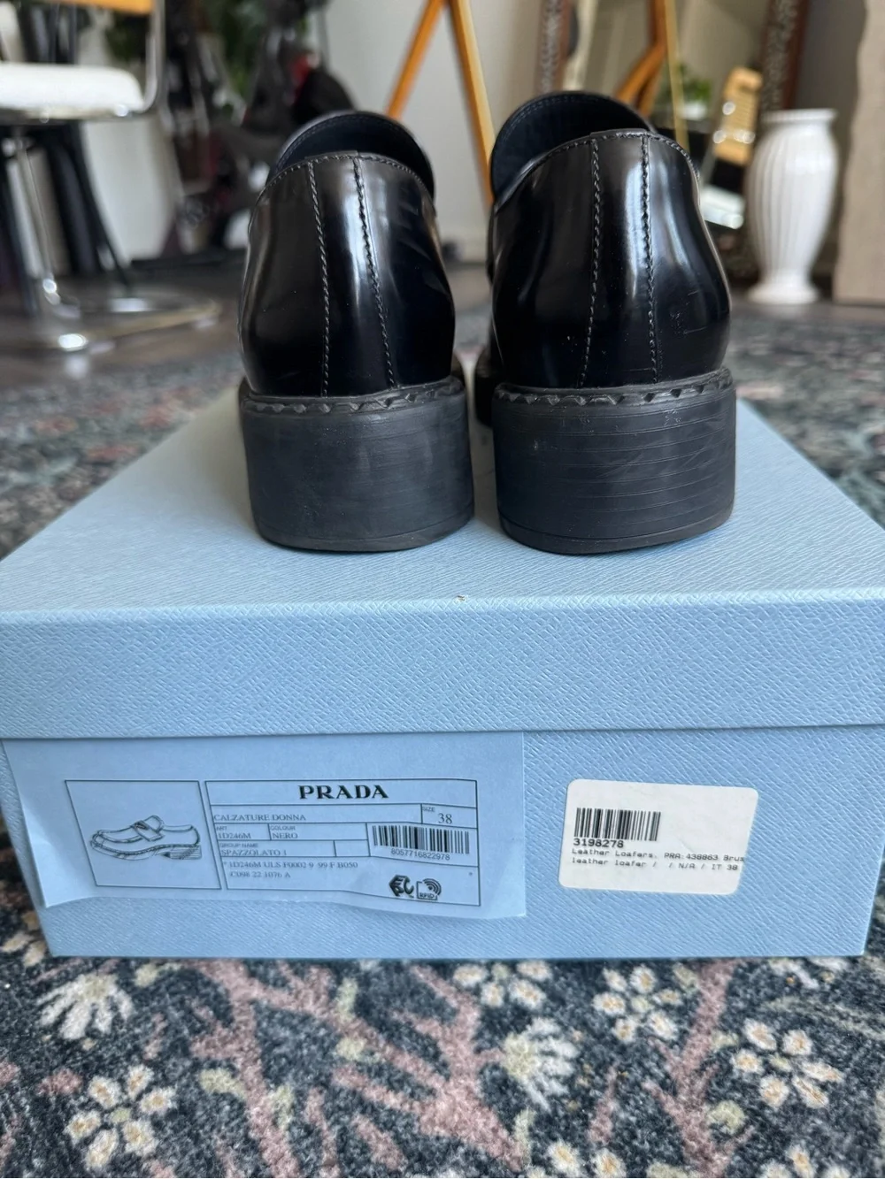 Prada Black Leather Penny Loafers with Triangular Logo